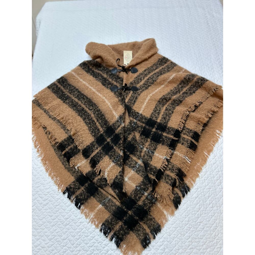 St.John’s beautiful, new with tags poncho